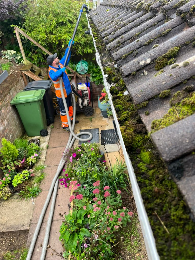 Apex DroneView Gutter Care professional team with gutter cleaning equipment in Hampshire