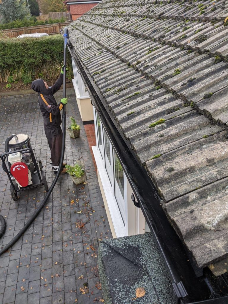 After professional gutter cleaning - completely clean gutters with free-flowing water drainage